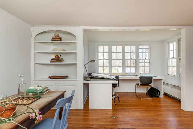 265 Housatonic River Rd, Salisbury, CT 06068 - office area featuring radiator heating unit and wood finished floors