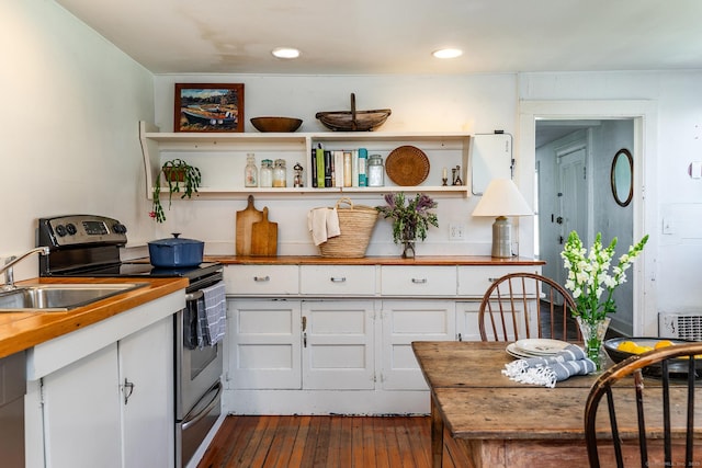 265 Housatonic River Rd, Salisbury, CT 06068 - kitchen featuring stainless steel electric range, a sink, butcher block countertops, dark wood finished floors, and white cabinetry