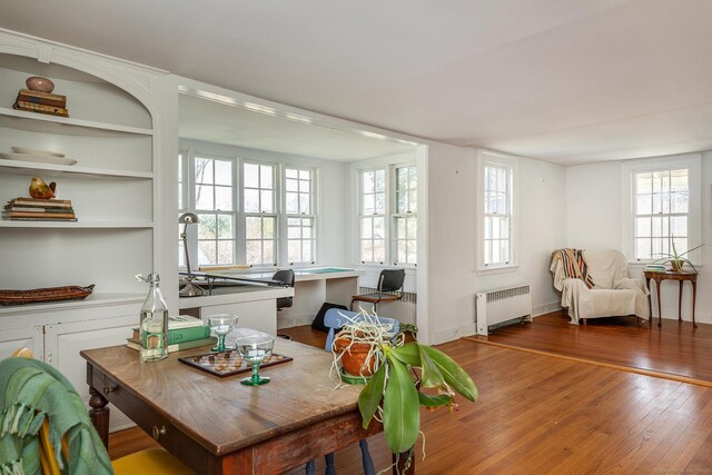 265 Housatonic River Rd, Salisbury, CT 06068 - dining space featuring radiator and wood finished floors