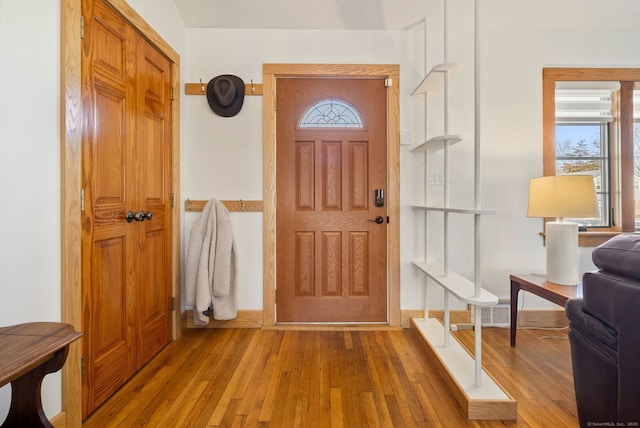 93 Lyman Rd, West Hartford, CT 06117 - entryway featuring baseboards and wood finished floors