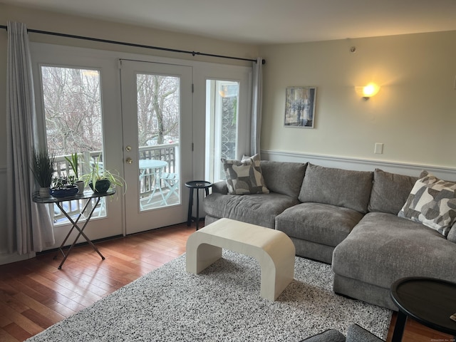 living area with hardwood / wood-style floors