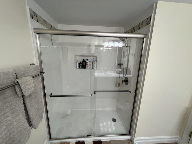 full bath featuring a stall shower