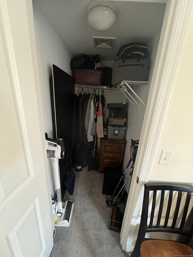 walk in closet with carpet flooring and visible vents