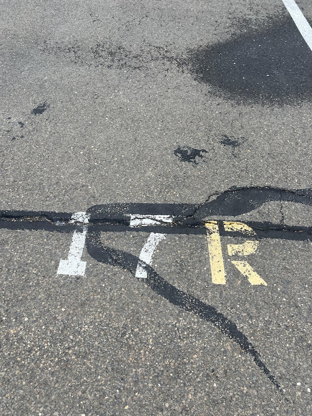 exterior details featuring a parking lot