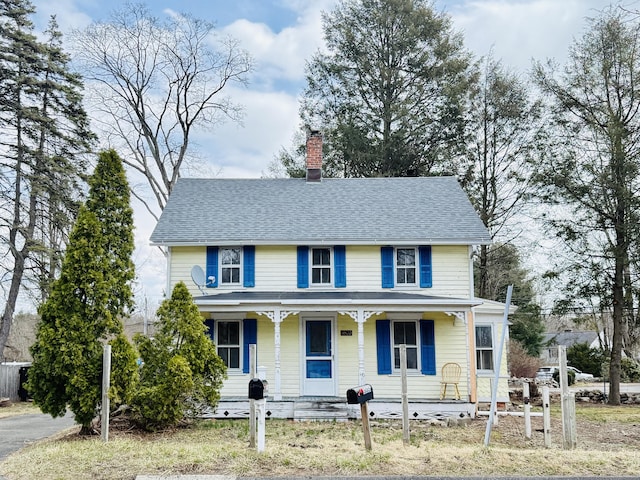 152 Partrick Ave, Norwalk, CT 06851 - view of front of house featuring a porch, a chimney, and a shingled roof