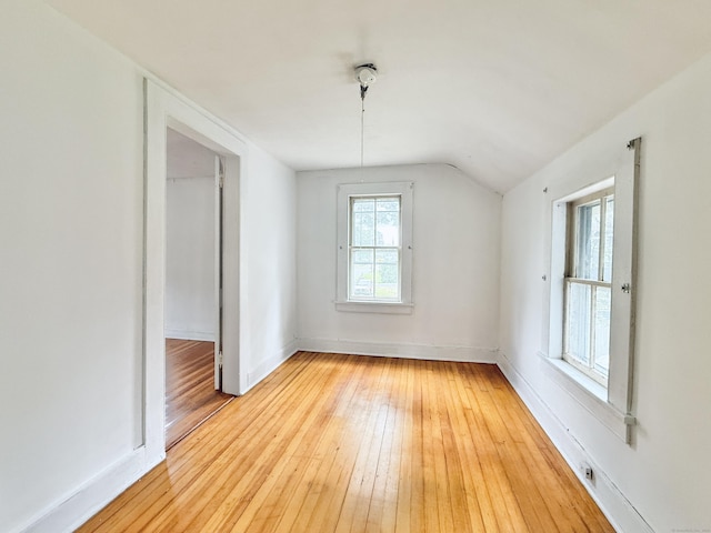 152 Partrick Ave, Norwalk, CT 06851 - additional living space featuring vaulted ceiling, light wood-type flooring, and baseboards