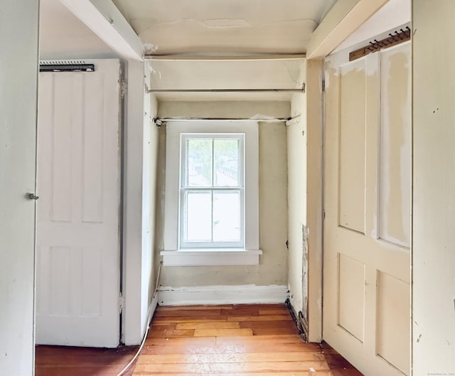 152 Partrick Ave, Norwalk, CT 06851 - hall with light wood-style flooring and baseboards