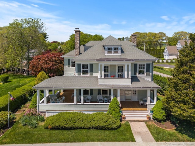 86 Tyler Ave, Groton, CT 06340 - view of front of property with a chimney, covered porch, and roof with shingles