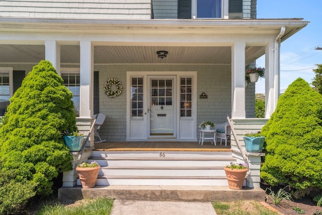 86 Tyler Ave, Groton, CT 06340 - doorway to property with a porch