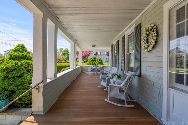 86 Tyler Ave, Groton, CT 06340 - wooden deck with covered porch