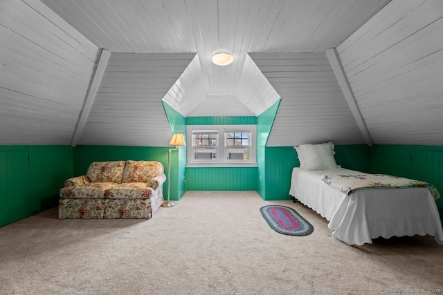 86 Tyler Ave, Groton, CT 06340 - bedroom with lofted ceiling, carpet floors, wood ceiling, and wood walls