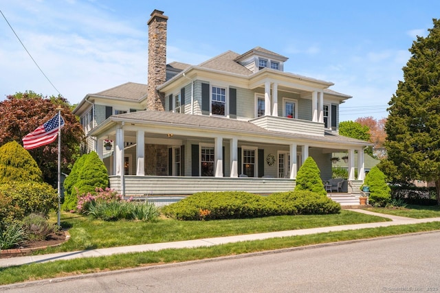 86 Tyler Ave, Groton, CT 06340 - view of front of house with a porch and a chimney