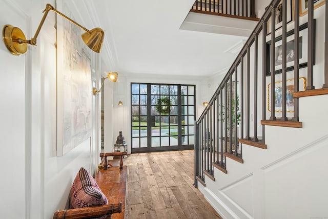 358 Lukes Wood Rd, New Canaan, CT 06840 - foyer featuring stairway, hardwood / wood-style floors, and crown molding