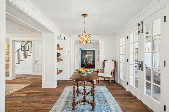 358 Lukes Wood Rd, New Canaan, CT 06840 - living area featuring dark wood-type flooring, french doors, ornamental molding, stairs, and baseboards