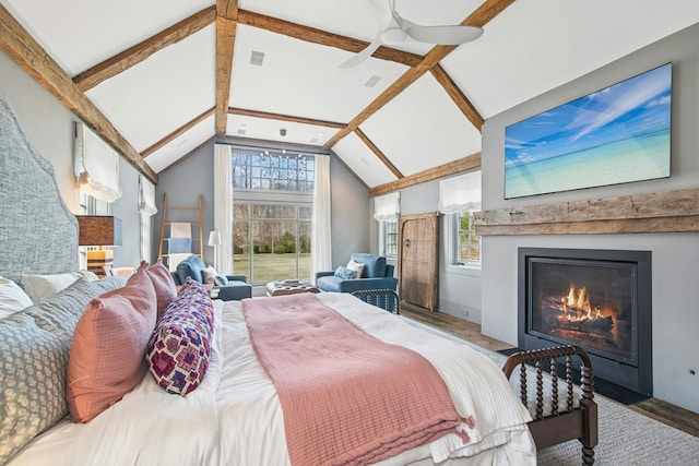 358 Lukes Wood Rd, New Canaan, CT 06840 - bedroom with wood finished floors and a fireplace with flush hearth