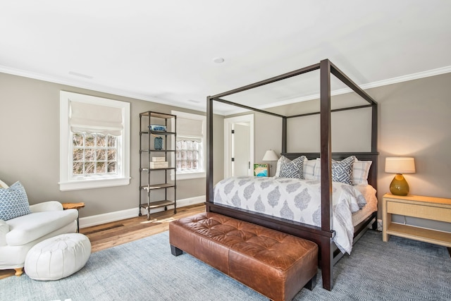 358 Lukes Wood Rd, New Canaan, CT 06840 - bedroom with ornamental molding, wood finished floors, and baseboards