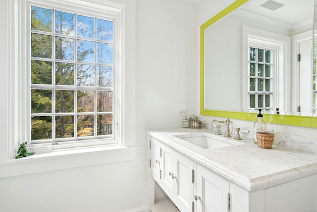 358 Lukes Wood Rd, New Canaan, CT 06840 - bathroom with vanity, healthy amount of natural light, and baseboards