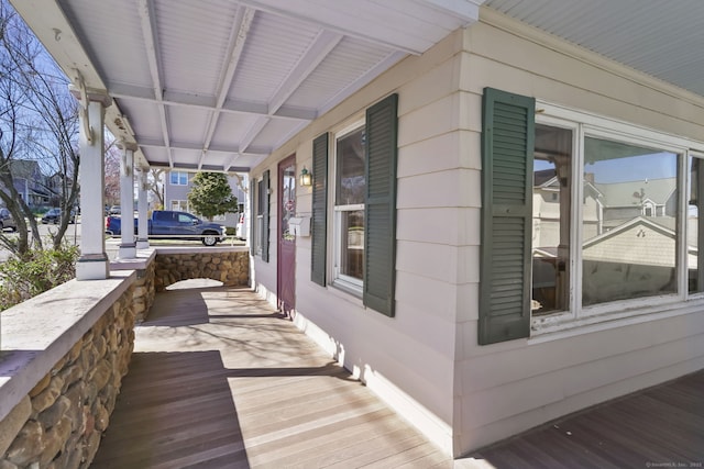 deck with covered porch
