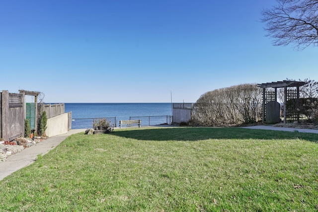 view of water feature featuring fence