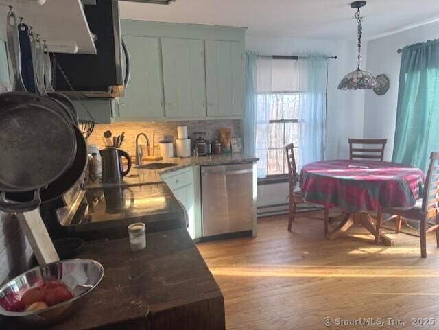 38 High St, Middlefield, CT 06455 - kitchen with decorative backsplash, a sink, light wood-type flooring, hanging light fixtures, and stainless steel dishwasher