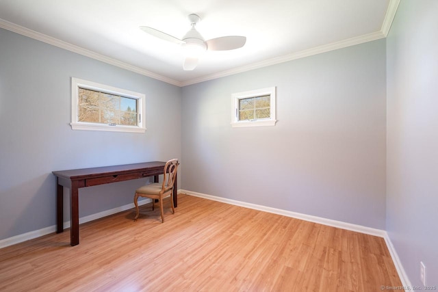 office area featuring baseboards, light wood-style floors, ceiling fan, and crown molding