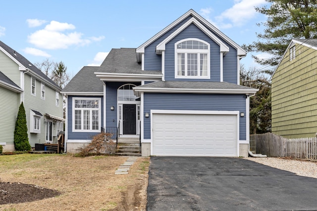 18 Catalpa St, Norwalk, CT 06851 - traditional-style home featuring roof with shingles, an attached garage, aphalt driveway, central AC unit, and fence