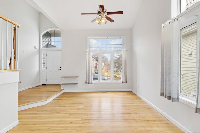 18 Catalpa St, Norwalk, CT 06851 - entryway with high vaulted ceiling, light wood-style flooring, baseboards, and a ceiling fan
