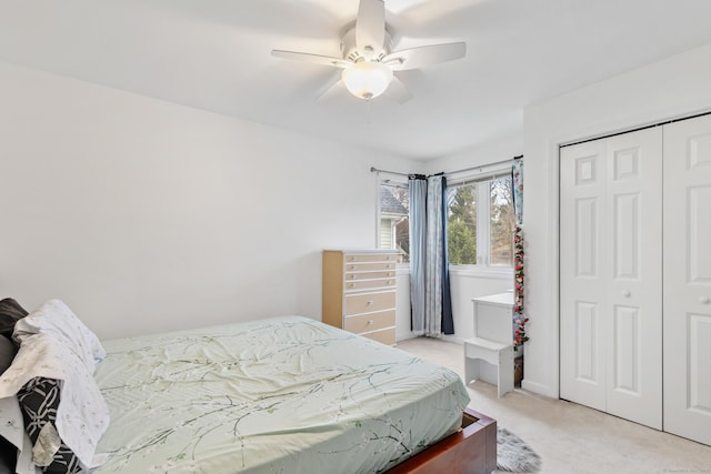 18 Catalpa St, Norwalk, CT 06851 - bedroom with light carpet, a closet, and a ceiling fan