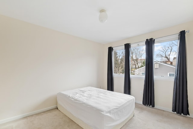 18 Catalpa St, Norwalk, CT 06851 - bedroom featuring light carpet and baseboards