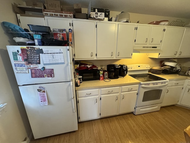 519 Scott Rd Apt 60, Waterbury, CT 06705 - kitchen featuring white appliances, light wood-type flooring, white cabinets, and under cabinet range hood