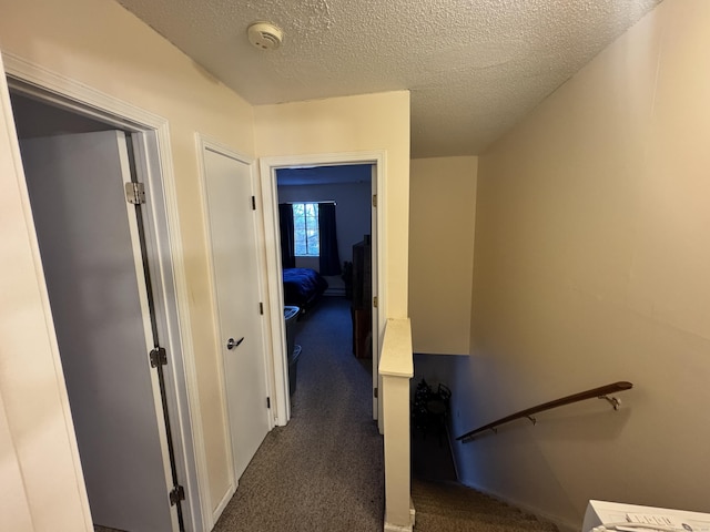 519 Scott Rd Apt 60, Waterbury, CT 06705 - hallway with carpet floors and a textured ceiling