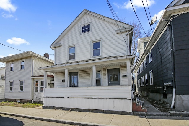 view of front of house featuring covered porch