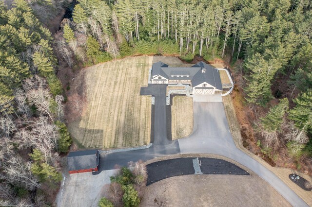 bird's eye view with a forest view