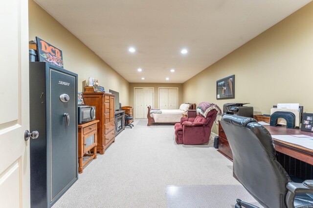 office space with light carpet and recessed lighting