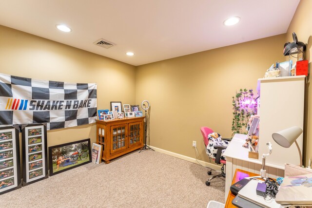 carpeted home office featuring baseboards, visible vents, and recessed lighting