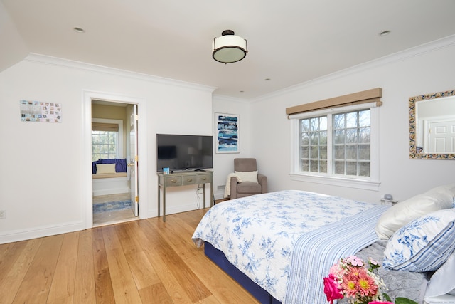 355 Greens Farms Rd, Westport, CT 06880 - bedroom with crown molding, baseboards, multiple windows, and light wood-type flooring