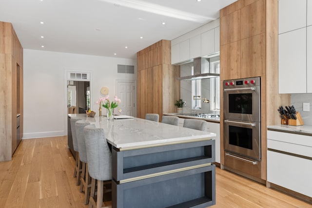 355 Greens Farms Rd, Westport, CT 06880 - kitchen featuring visible vents, modern cabinets, double oven, a warming drawer, and white cabinetry