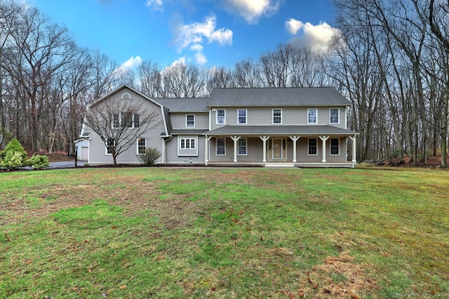 110 Far Mill Dr, Stratford, CT 06614 - view of front facade with a porch, a shingled roof, and a front lawn
