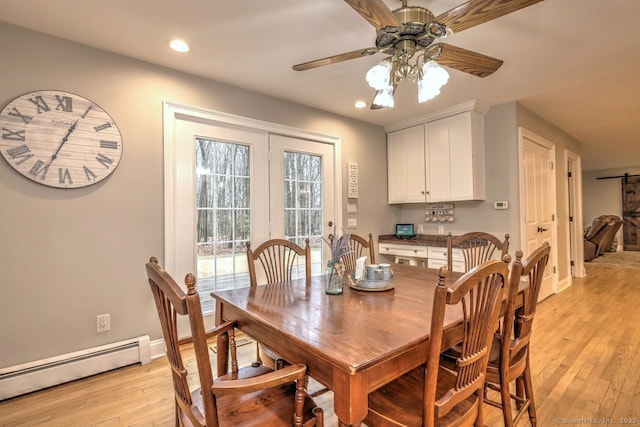 110 Far Mill Dr, Stratford, CT 06614 - dining area with light wood finished floors, ceiling fan, recessed lighting, and baseboard heating