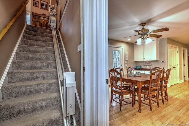110 Far Mill Dr, Stratford, CT 06614 - dining room with recessed lighting, a ceiling fan, light wood-style floors, and stairs