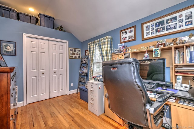 110 Far Mill Dr, Stratford, CT 06614 - home office with baseboards, vaulted ceiling, and wood finished floors