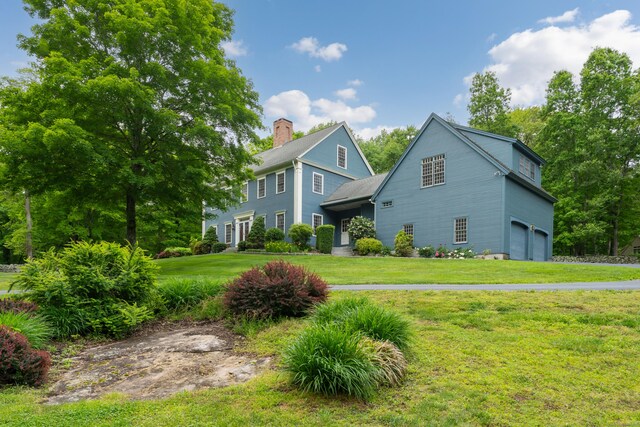 6 Ely Ln, Killingworth, CT 06419 - view of home's exterior featuring a garage and a yard