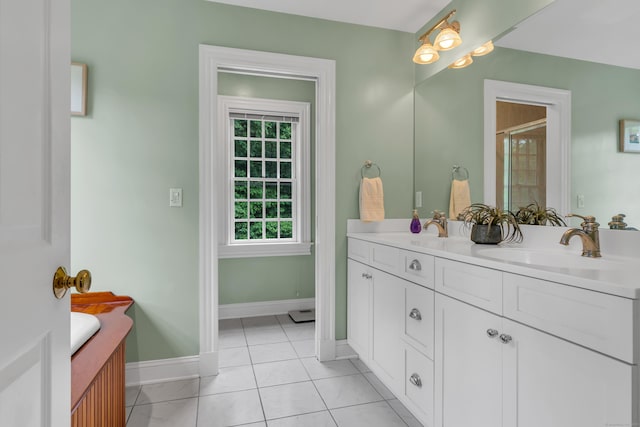 6 Ely Ln, Killingworth, CT 06419 - full bathroom with double vanity, baseboards, a stall shower, and tile patterned flooring