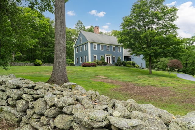6 Ely Ln, Killingworth, CT 06419 - view of property exterior with a chimney and a lawn