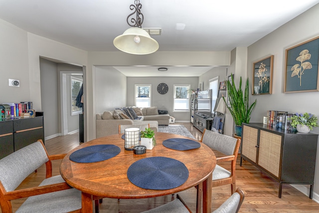 188 Meadow St, Branford, CT 06405 - dining area featuring visible vents, baseboards, and light wood-style floors