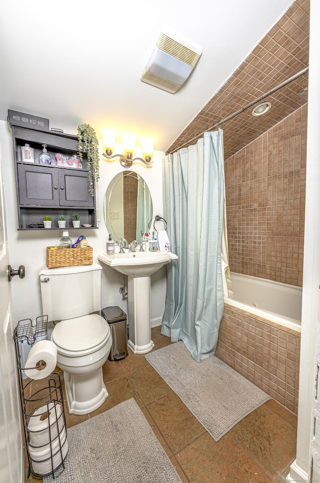 188 Meadow St, Branford, CT 06405 - bathroom with tile patterned flooring, visible vents, toilet, tiled shower / bath combo, and a sink