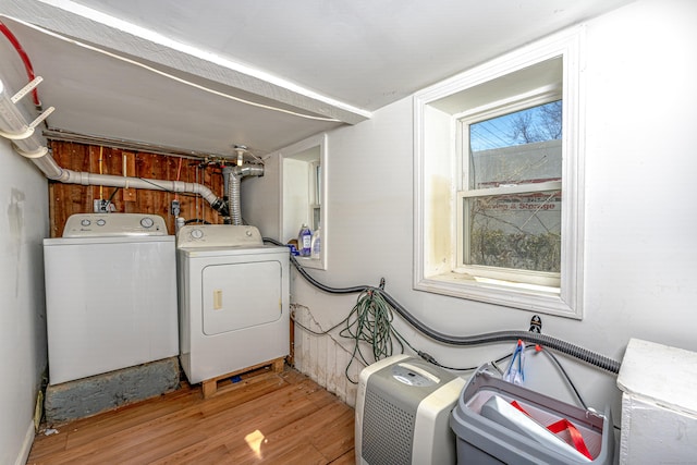 188 Meadow St, Branford, CT 06405 - laundry room featuring light wood-style flooring, washer and dryer, and laundry area