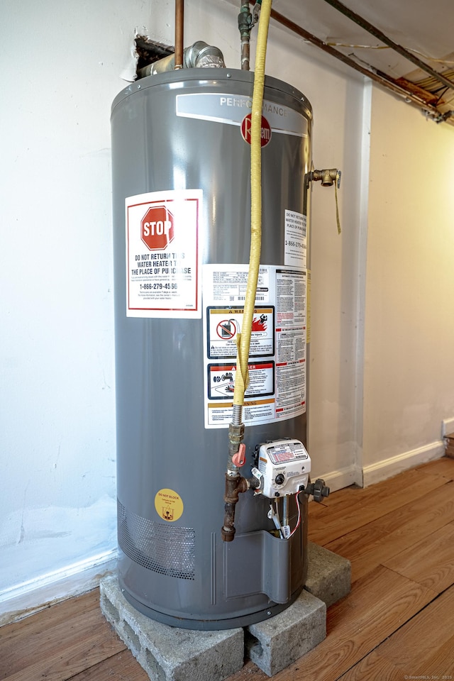 188 Meadow St, Branford, CT 06405 - utility room featuring water heater