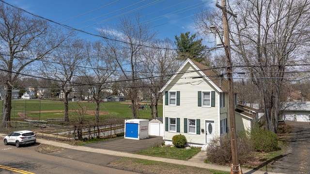 188 Meadow St, Branford, CT 06405 - traditional-style house featuring fence and aphalt driveway