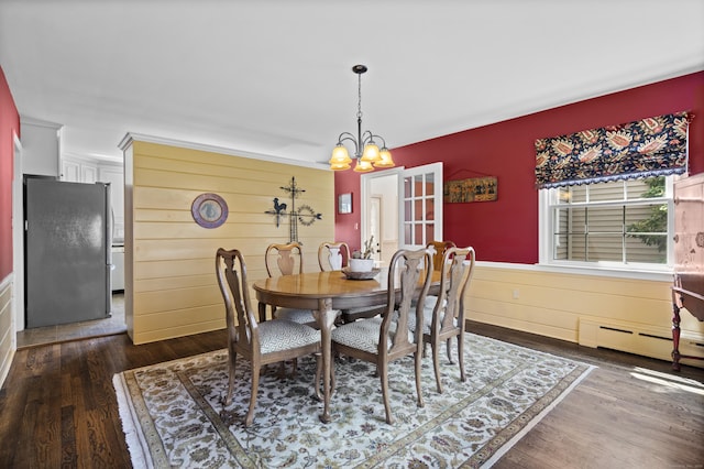 15 Maple Ln, Brookfield, CT 06804 - dining room featuring an inviting chandelier, a baseboard radiator, a wainscoted wall, and dark wood-style floors